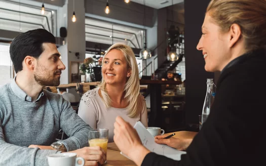 Couple and agent at listing appointment